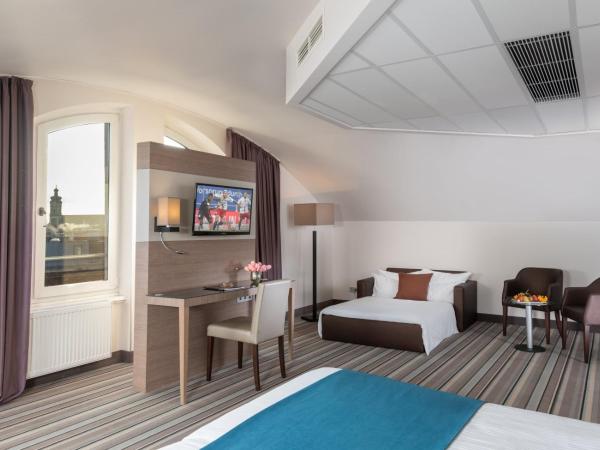 Leonardo Hotel Munich City Olympiapark : photo 2 de la chambre suite junior quadruple