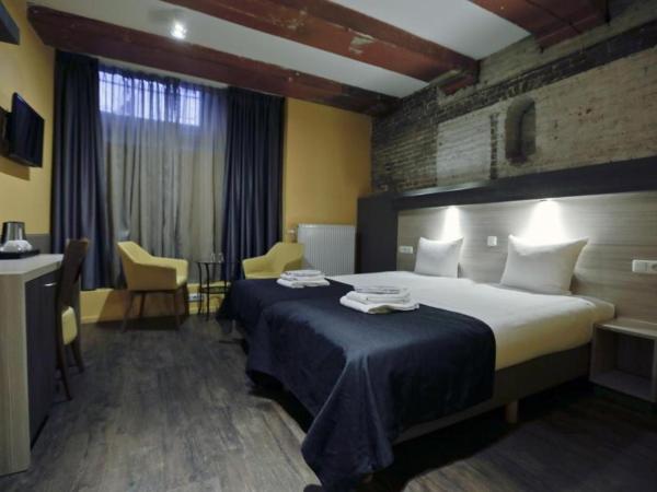 City Hotel Amsterdam : photo 7 de la chambre chambre lits jumeaux en sous-sol