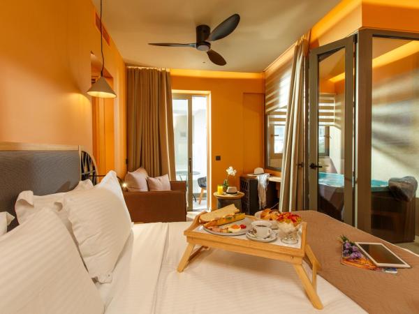 Palmera Beach Hotel & Spa - Adults Only : photo 2 de la chambre suite supérieure deluxe avec hammam et jacuzzi