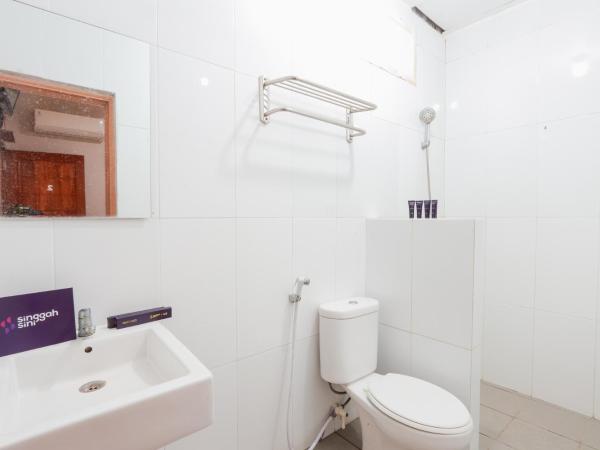 Singgahsini Griya Raflesia Kebayoran Lama : photo 5 de la chambre chambre double standard