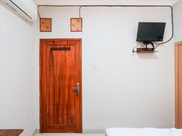 Singgahsini Griya Raflesia Kebayoran Lama : photo 2 de la chambre chambre double standard