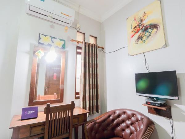 Singgahsini Griya Raflesia Kebayoran Lama : photo 10 de la chambre chambre double standard