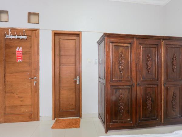 Singgahsini Griya Raflesia Kebayoran Lama : photo 9 de la chambre chambre double standard