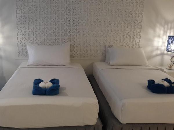 PP Blue Sky Resort-SHA Plus : photo 3 de la chambre bungalow lits jumeaux de luxe - vue sur jardin