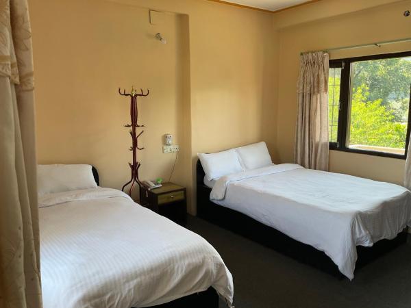 Trekkers Lodge : photo 3 de la chambre chambre triple standard