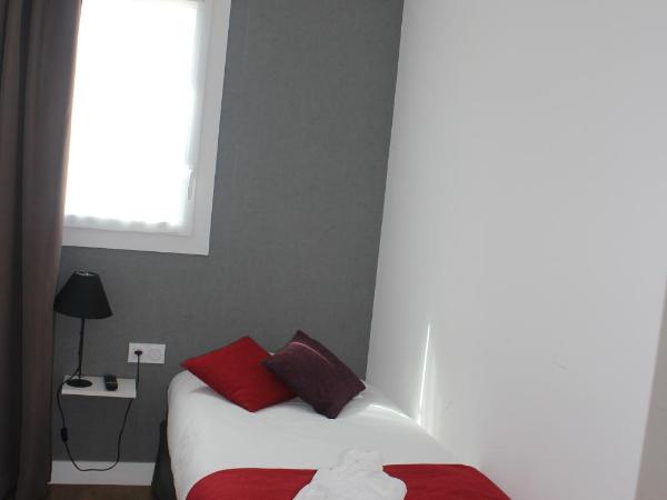 La Villa en L'île - 2 Piscines & Spa : photo 2 de la chambre chambre triple