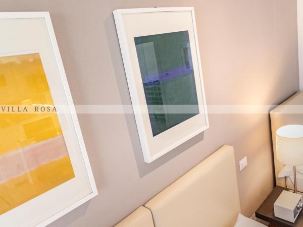 B&B Villa Rosa : photo 7 de la chambre chambre quadruple avec salle de bains privative