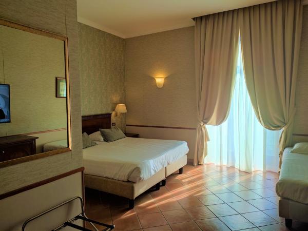 Hotel Nuvò : photo 2 de la chambre chambre triple