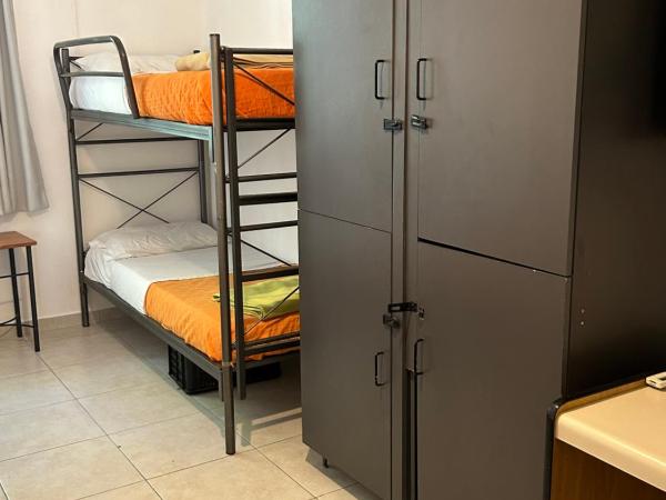 Reina Madre Hostel : photo 10 de la chambre lit simple dans dortoir de 4 lits