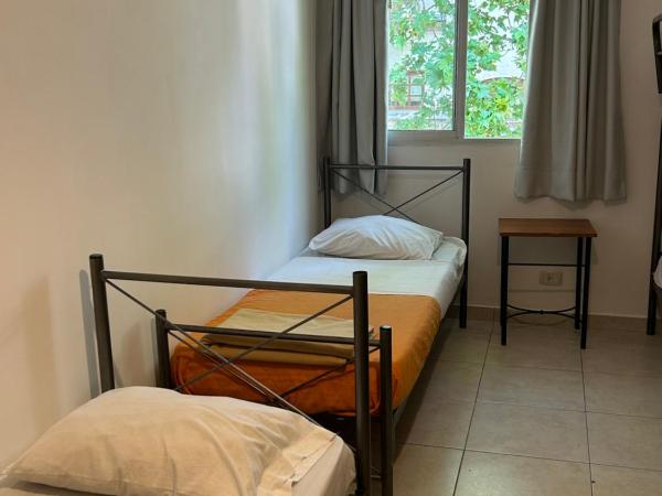 Reina Madre Hostel : photo 8 de la chambre lit simple dans dortoir de 4 lits