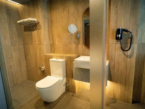 Hotel Bencoolen at Hong Kong Street : photo 1 de la chambre hébergement lit king-size exécutif (nouvelle aile)