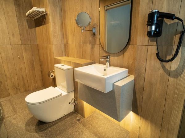 Hotel Bencoolen at Hong Kong Street : photo 2 de la chambre hébergement lit king-size exécutif (nouvelle aile)