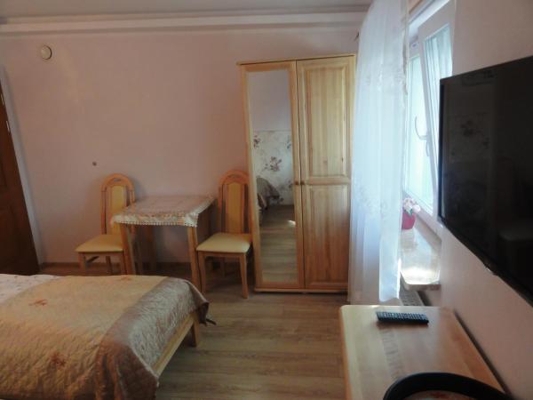 Sopot Roza Apartments : photo 3 de la chambre chambre double ou lits jumeaux avec douche