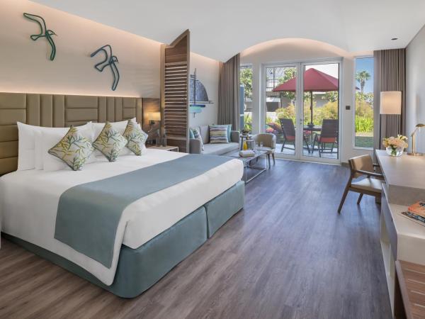 JA The Resort - JA Palm Tree Court, Dubai : photo 1 de la chambre suite junior avec terrasse - vue sur jardin