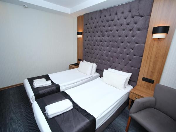 Grand Silay Hotel : photo 9 de la chambre chambre lits jumeaux Économique