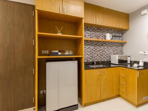 FuramaXclusive Sukhumvit : photo 5 de la chambre chambre double ou lits jumeaux premier