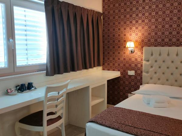 Nuova Opera Rooms : photo 5 de la chambre chambre double ou lits jumeaux - vue sur ville