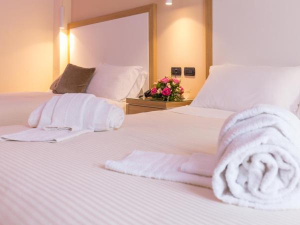 Hotel Villa Esperia : photo 3 de la chambre chambre quadruple supérieure 