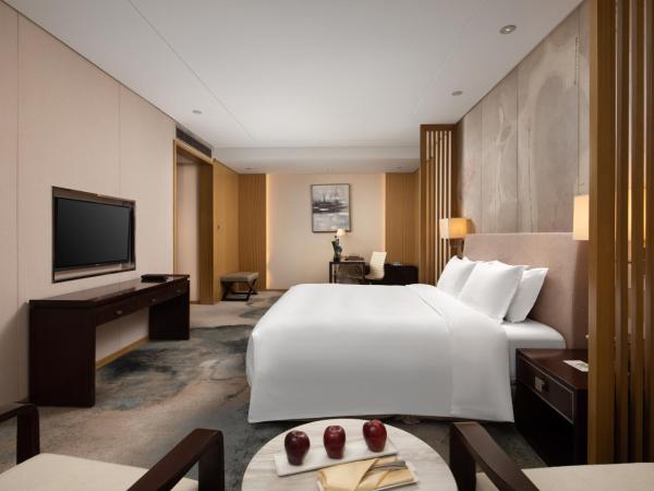 The Yun Hotel Hankou : photo 1 de la chambre chambre lit king-size exécutive