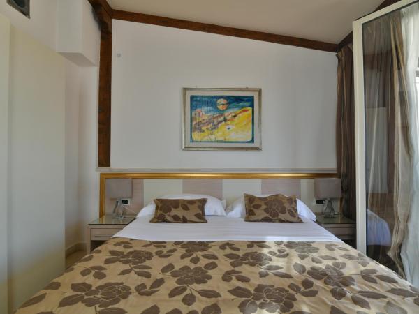 Hotel Le Chevalier : photo 3 de la chambre chambre lit queen-size deluxe