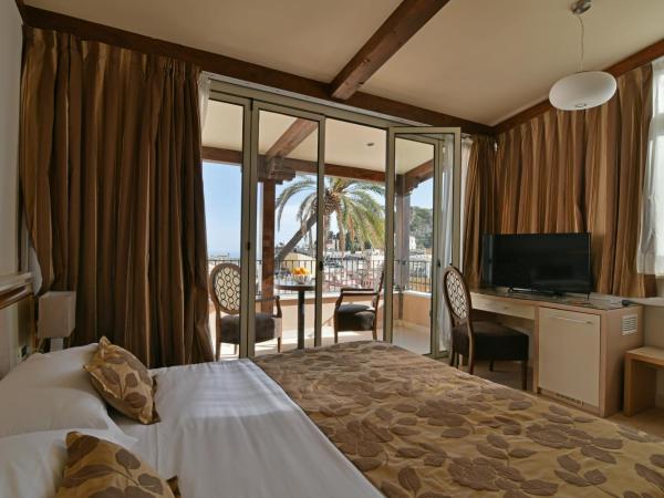 Hotel Le Chevalier : photo 6 de la chambre chambre lit queen-size deluxe