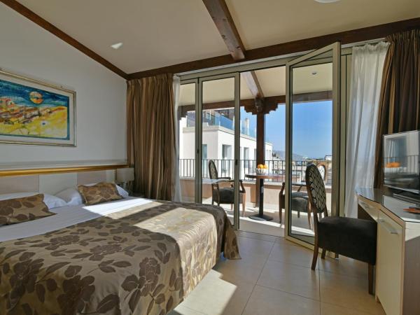 Hotel Le Chevalier : photo 1 de la chambre chambre lit queen-size deluxe