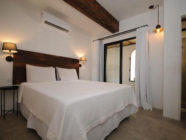 Villa Santa Fé : photo 2 de la chambre chambre deluxe