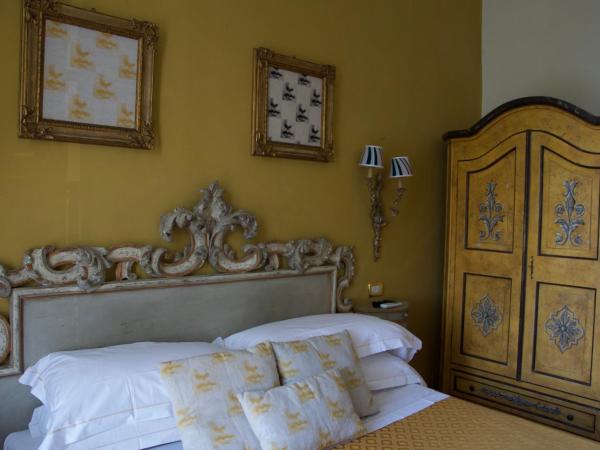 Residenza Vespucci : photo 10 de la chambre chambre double ou lits jumeaux de luxe avec balcon - vue sur rivière