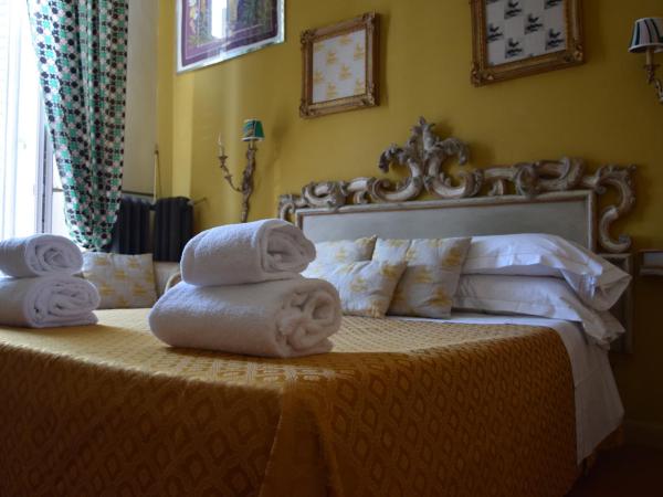 Residenza Vespucci : photo 1 de la chambre chambre double ou lits jumeaux de luxe avec balcon - vue sur rivière