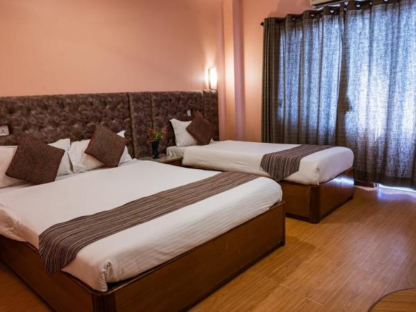 Kathmandu Prince Hotel : photo 1 de la chambre chambre triple deluxe
