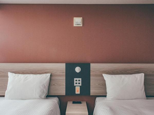 Kuretake Inn Premium Nagoya Nayabashi : photo 2 de la chambre chambre lits jumeaux de luxe - non-fumeurs