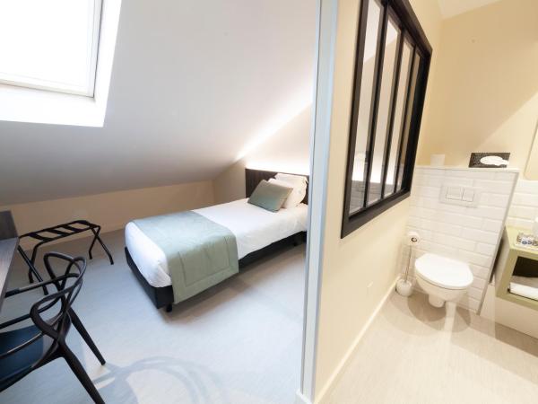 Quality Hotel Clermont Kennedy : photo 3 de la chambre chambre 1 lit simple - non-fumeurs
