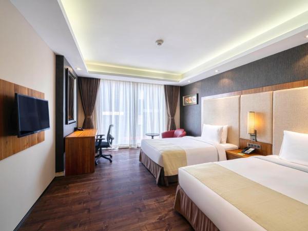 Holiday Inn Kolkata Airport, an IHG Hotel : photo 5 de la chambre standard twin room with walk-in shower and 15% discount on food, soft beverages and laundry