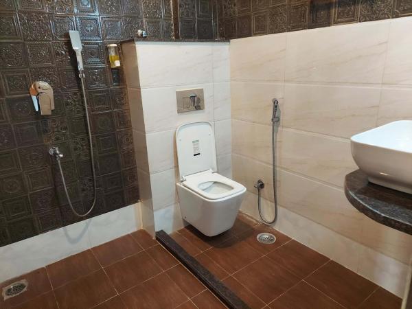 Gems Suites-A Boutique Stay : photo 2 de la chambre chambre lit king-size deluxe