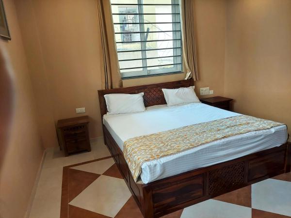 Gems Suites-A Boutique Stay : photo 1 de la chambre chambre lit king-size deluxe