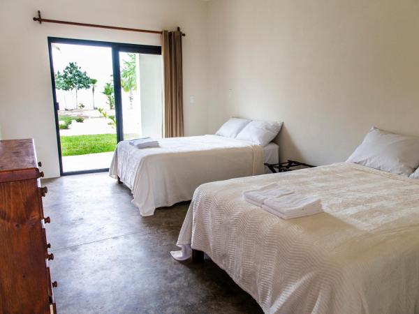 Ikarus Costa Mujeres Eco Lodge Sunset View : photo 7 de la chambre chambre double avec salle de bains privative