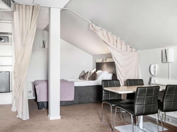Best Western Plus John Bauer Hotel : photo 3 de la chambre hébergement 2 chambres avec lit king-size et lit double