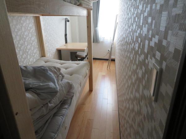 Sapporo Guest House Nariya : photo 10 de la chambre petite chambre lits jumeaux