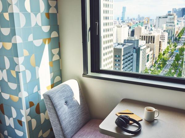 Holiday Inn Express Osaka City Centre- Midosuji, an IHG Hotel : photo 7 de la chambre room with three single beds and city view - high floor