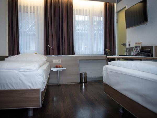 Hotel Alexander Zurich Old Town : photo 7 de la chambre chambre lits jumeaux