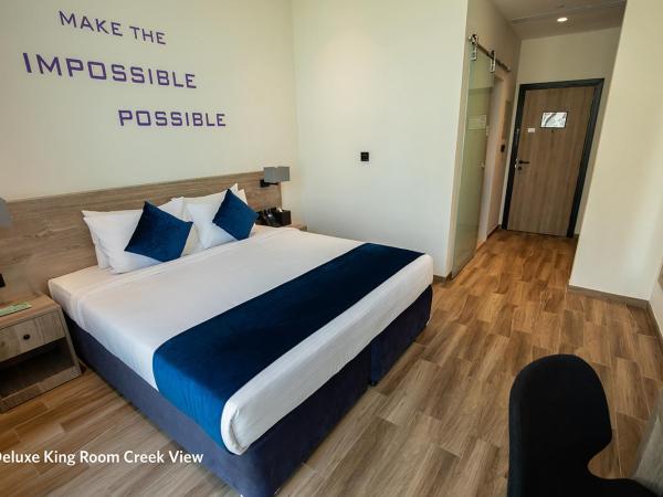 Grand Kingsgate Jaddaf Waterfront Hotel by Millennium : photo 1 de la chambre deluxe room king bed with waterfront view