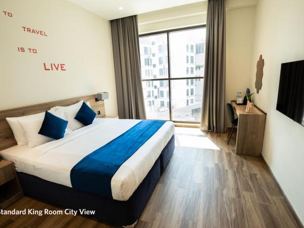 Grand Kingsgate Jaddaf Waterfront Hotel by Millennium : photo 1 de la chambre standard room king bed