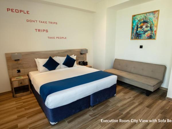 Grand Kingsgate Jaddaf Waterfront Hotel by Millennium : photo 2 de la chambre executive room waterfront view with sofa bed
