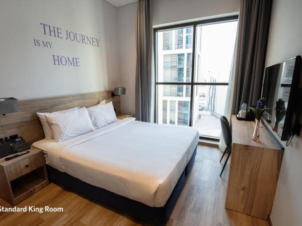 Kingsgate Canal Hotel by Millennium : photo 1 de la chambre standard room king bed