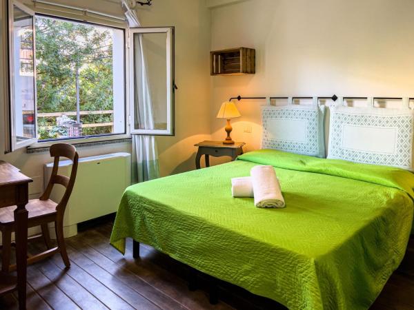 La Terrazza Guesthouse : photo 1 de la chambre chambre lits jumeaux - vue sur jardin