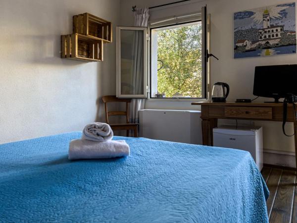 La Terrazza Guesthouse : photo 4 de la chambre chambre double ou lits jumeaux - vue sur jardin