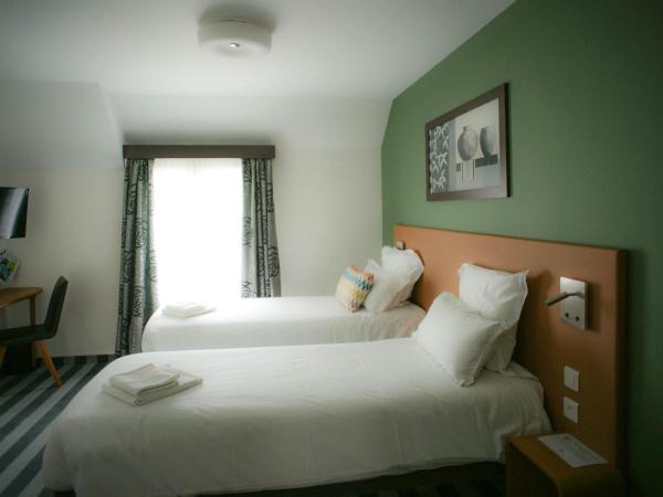 Logis Hôtel de l'Europe : photo 1 de la chambre chambre lits jumeaux confort - non-fumeurs