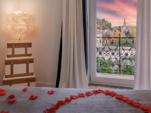 Belfry & Spa by Ligne St Barth : photo 5 de la chambre suite deluxe avec balcon et accès gratuit au spa - vue sur sanctuaire