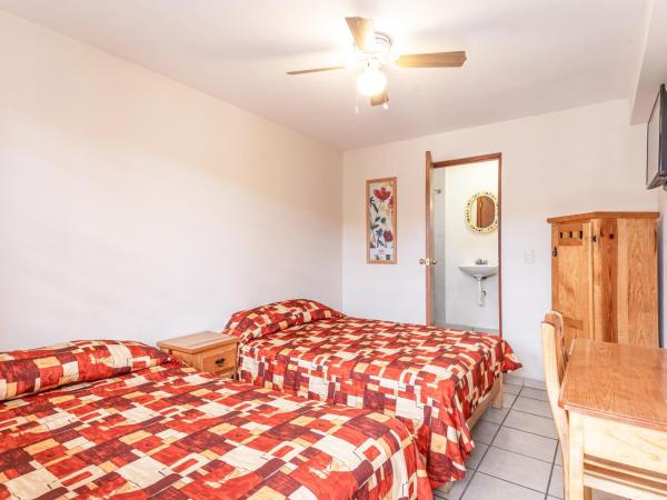 Cinco de Mayo Hotel : photo 1 de la chambre chambre lits jumeaux