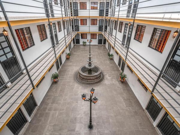 Cinco de Mayo Hotel : photo 3 de la chambre chambre deluxe avec 2 lits doubles